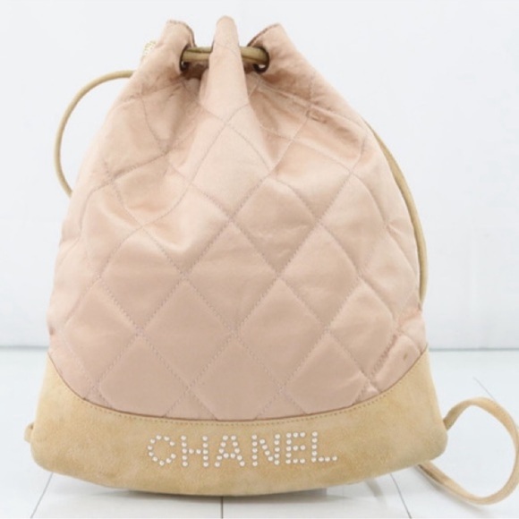 CHANEL Vintage Quilted Satin and Suede
Drawstring Backpack - Picture 2 of 13